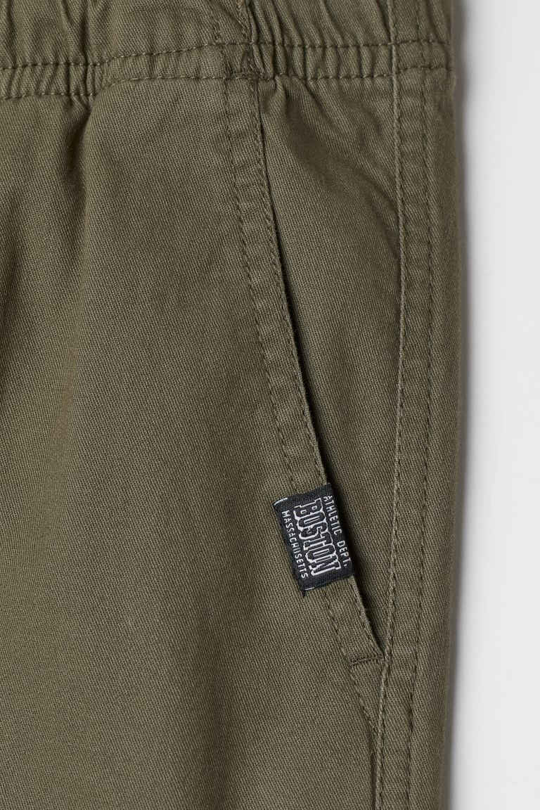 Штани  для хлопчика H&amp;M 0733253002 140 см (9-10 years) хакі 64548
